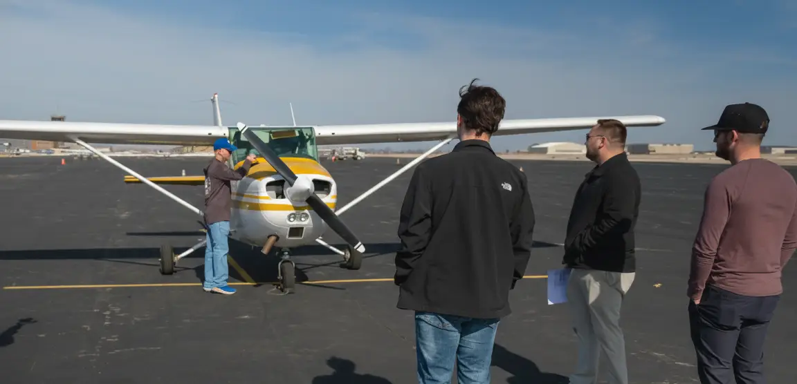 Pilot Instructional Center New Century KS - CFIs preparing Cessna plane at airport near Kansas City MO original