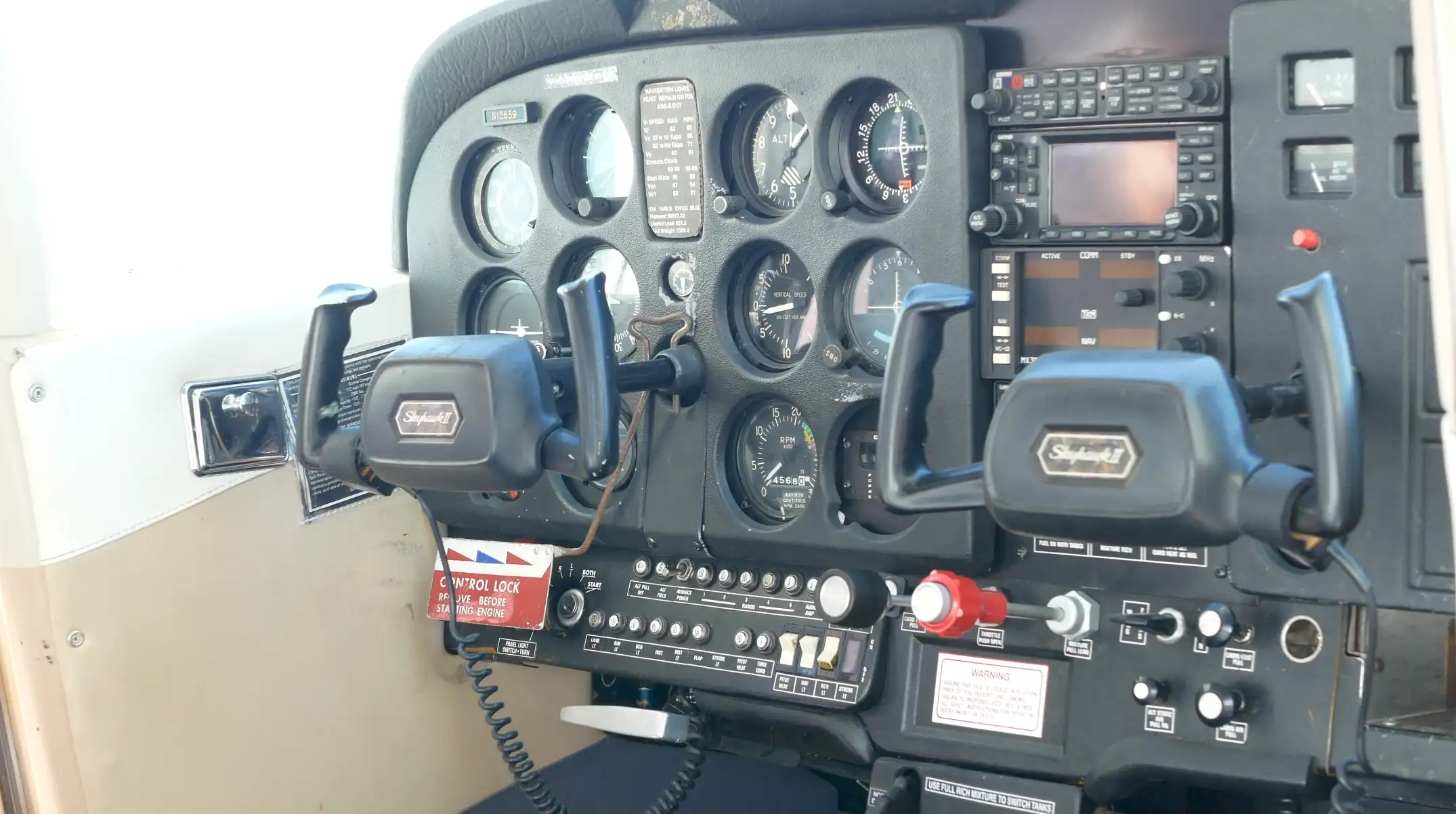 Pilot Instructional Center New Century KS - Cessna plane cockpit view during flight school pilot training