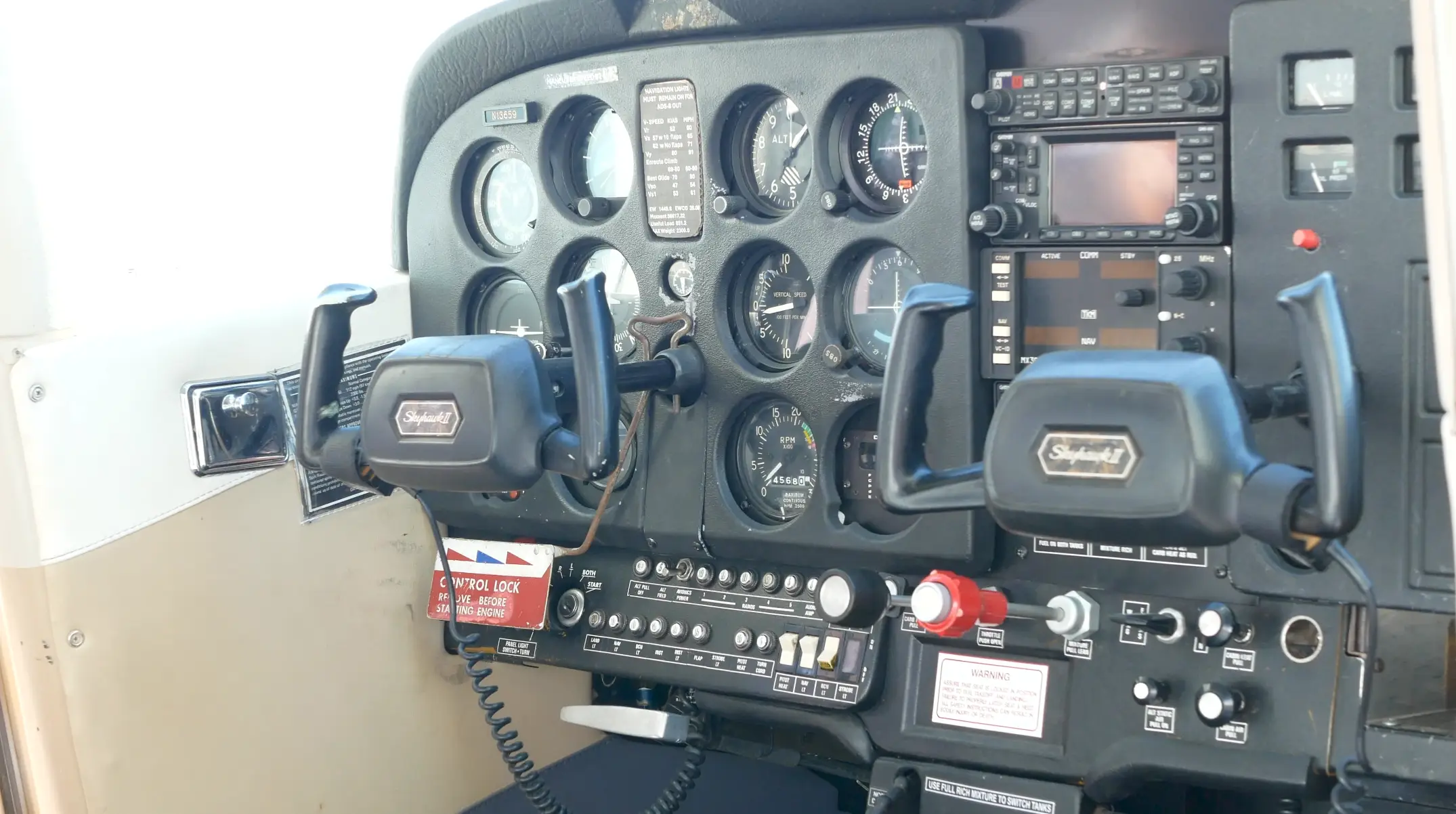 Pilot Instructional Center New Century KS - Cessna plane cockpit view during flight school pilot training