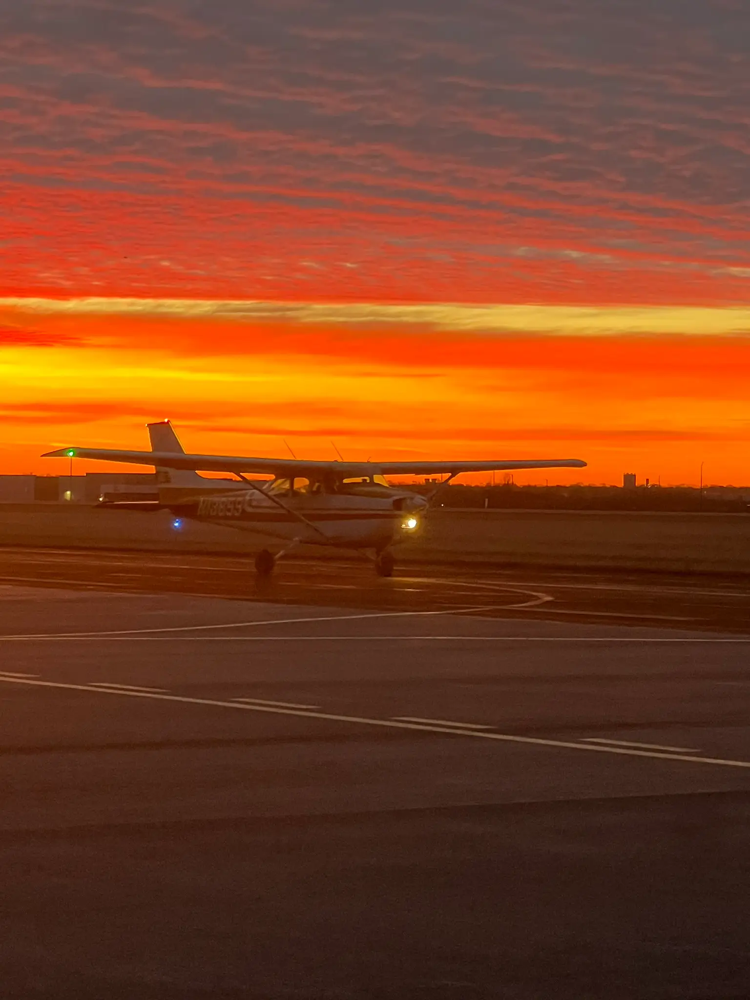 Cessna training aircraft during sunset at Pilot Instructional Center in Kansas