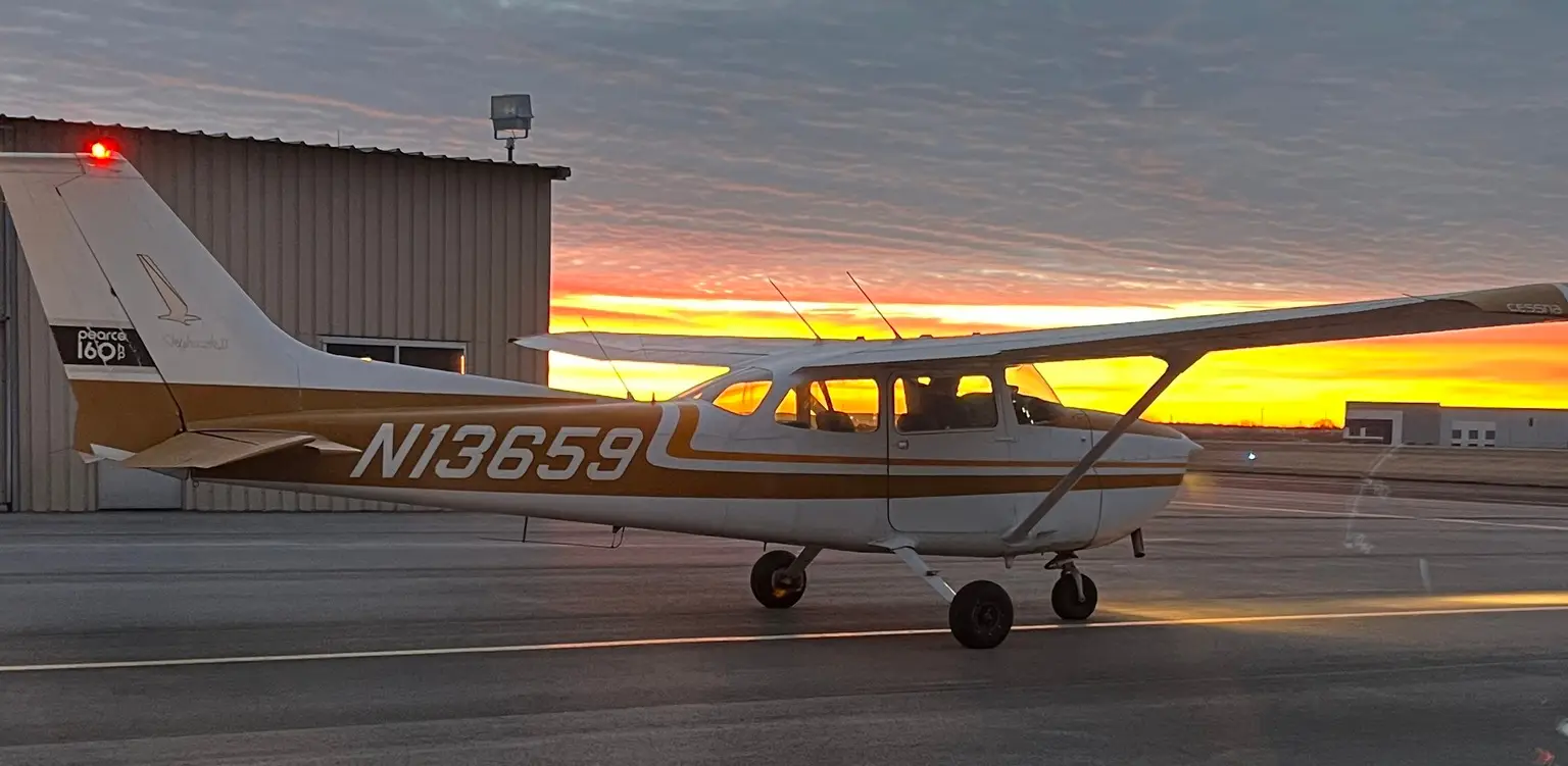 Pilot and Cessna aircraft near Kansas City