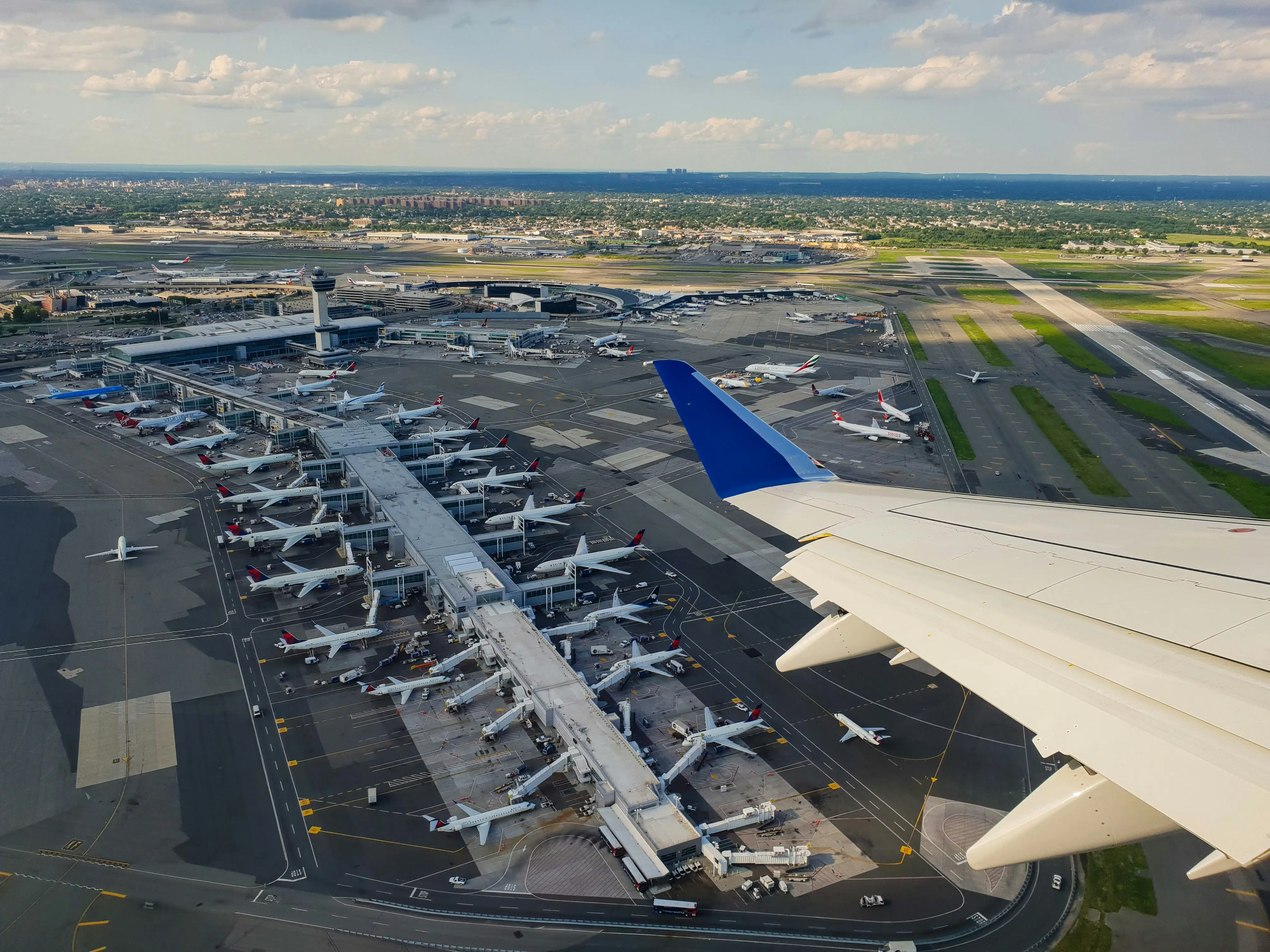 Commercial airplane wing view by Miguel Angel Sanz